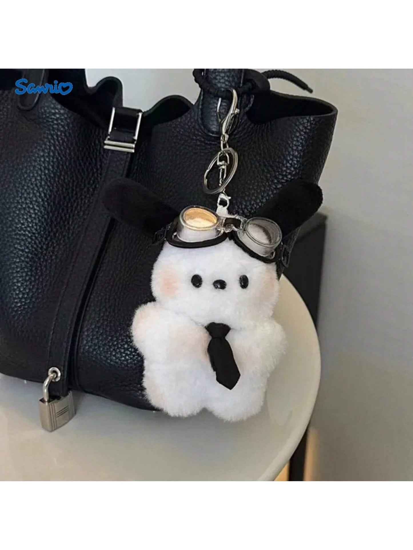 Llavero Sanrio peluche piloto Pochacco